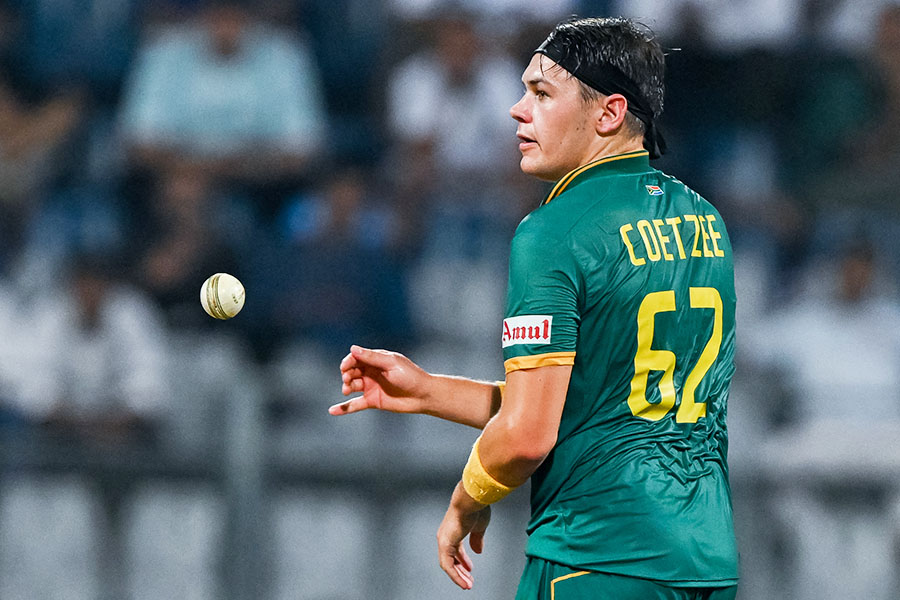 South Africa's Gerald Coetzee reacts after taking the wicket of Bangladesh's Nasum Ahmed during the 2023 ICC Men's Cricket World Cup one-day international (ODI) match between South Africa and Bangladesh at the Wankhede Stadium in Mumbai on October 24, 2023. Image: Indranil Mukherjee / AFP