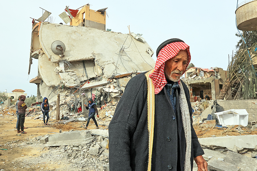 Palestinians check the rubble following Israeli bombardment in Khan Yunis in the southern Gaza Strip on December 21, 2023, amid continuing battles between Israel and the militant group Hamas. Image: SAID KHATIB / AFP