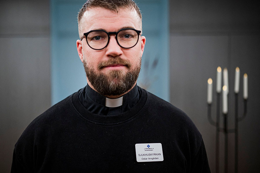 Oskar Arngarden, a 38-year-old Swedish Lutheran Church priest, is photographed at the chapel of Uppsala University Hospital on December 30, 2022. Image: Jonathan Nackstrand / AFP