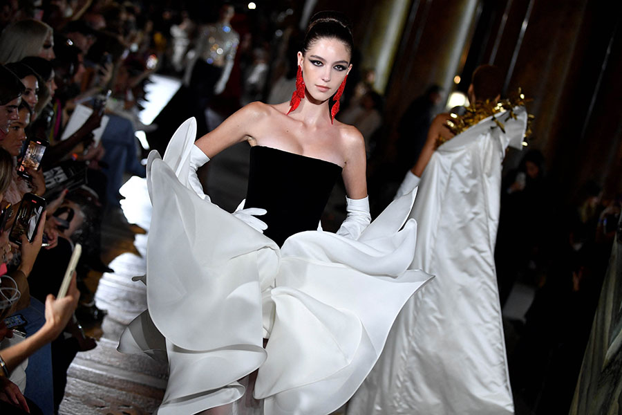 Over at the Opera Garnier, the 19th-century monument to late-imperial excess, couturier Stephane Rolland put on a fabulously opulent show. 
Image: Julien De Rosa / AFP