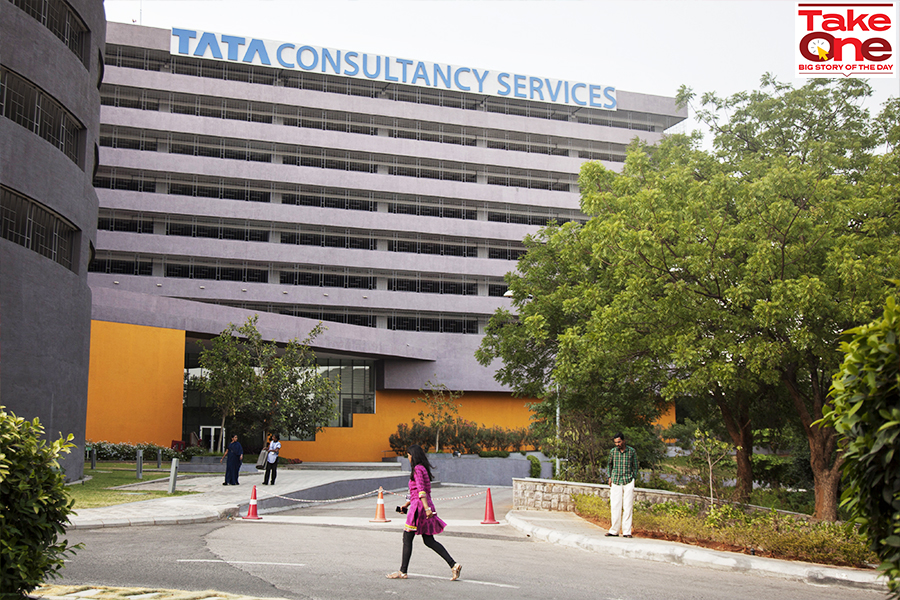 (File photo) Signage for Tata Consultancy Services Ltd. (TCS) is displayed atop of a building in the Synergy Park campus in Hyderabad, India, on Monday, April 11, 2016. Image: Namas Bhojani/Bloomberg via Getty Images
