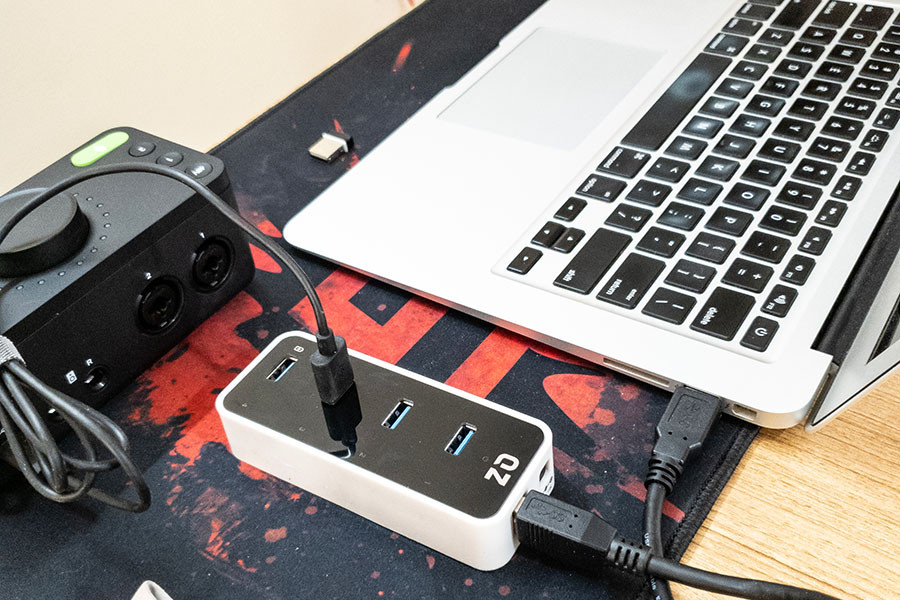 “Active powered” USB hubs have their own power, through an adaptor that one can just plug into a power strip, and a separate data cable that goes into the computer.