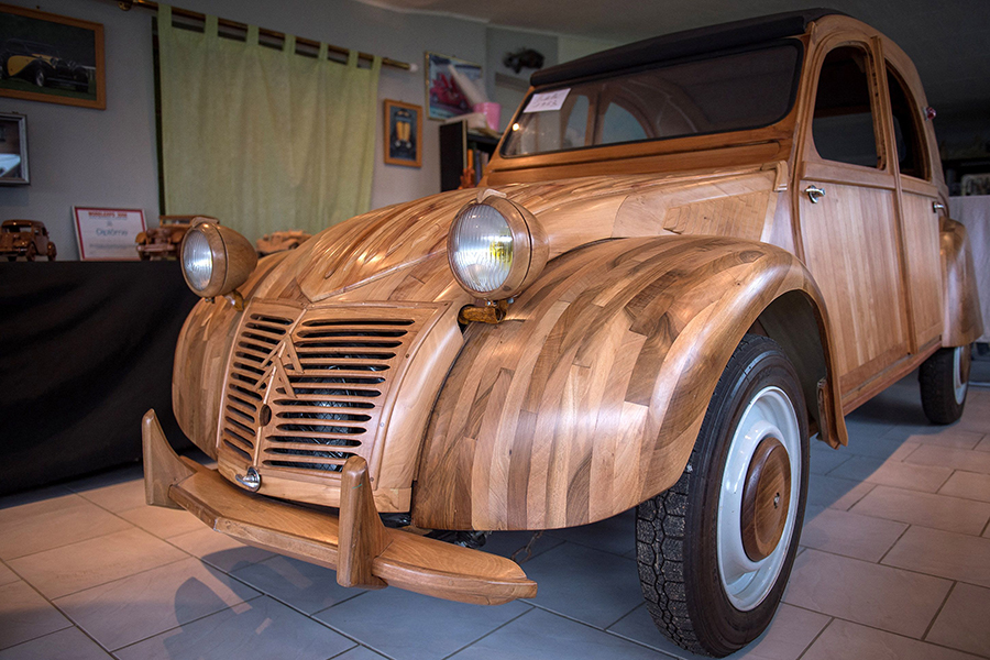 A Citroen 2CV made of wood, thought to be the only one of its kind, has sold for 210,000 euros (5,000) at auction in France, setting a new price record for the iconic vehicle.
Image: Guillaume Souvant / AFP©