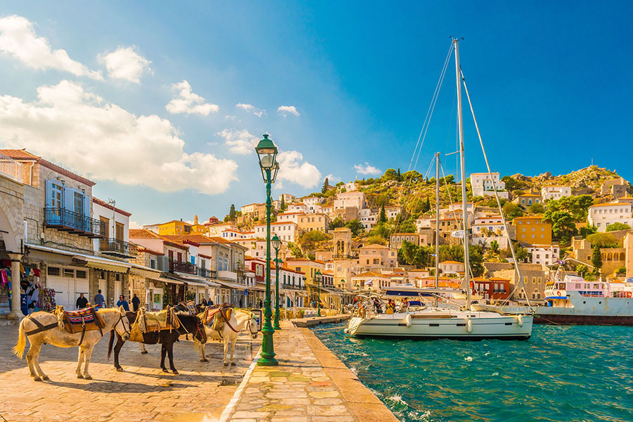 On the Greek island of Hydra, you get around by donkey. On the Greek island of Hydra, you get around by donkey. Image: CJ_Romas / Getty Images