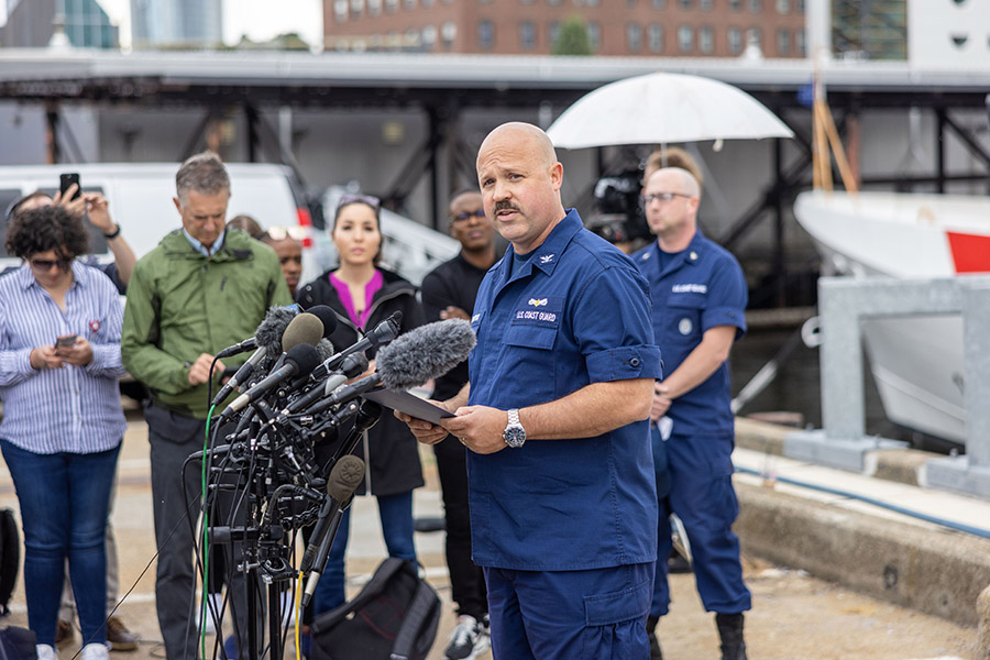 Capt. Jamie Frederick of the U.S. Coast Guard gives an update on the search. efforts for five people aboard the missing submersible, approximately 900 miles off Cape Cod, on June 20, 2023 in Boston, Massachusetts. Image: Scott Eisen/Getty Images