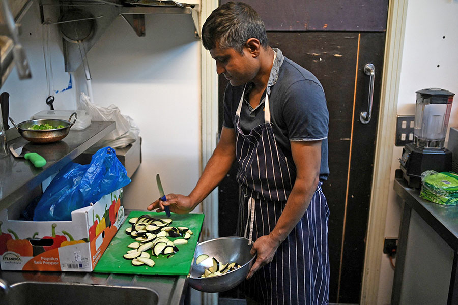 Staff prepare ingredients used in balti dishes in the kitchen of 'Shababs' restaurant in the 'Balti Triangle' area of Birmingham, central England.
Image: Oli Scarff / AFP©