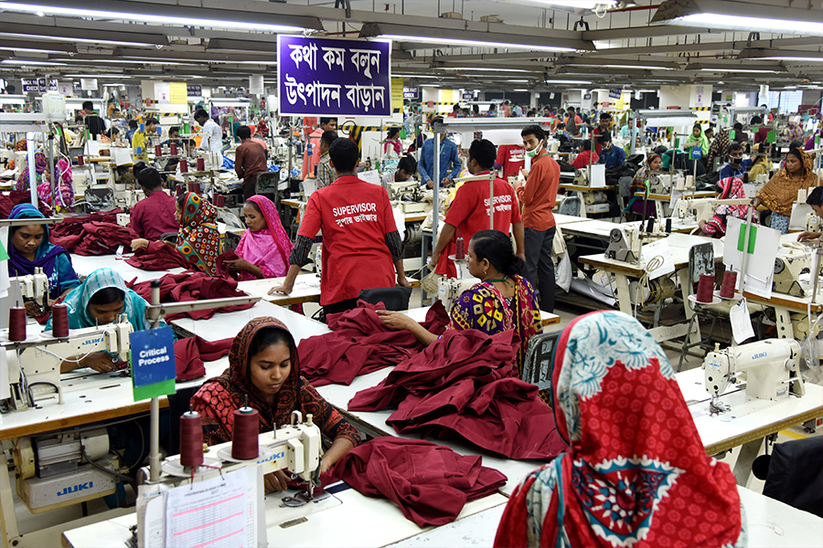 Bangladeshi workers working at a garment factory in Savar outskirts of Dhaka, Bangladesh. Image: Mamunur Rashid/NurPhoto via Getty Images