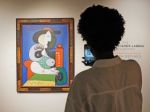 Picasso's 'Woman with a Watch' fetches $139 million at New York auction