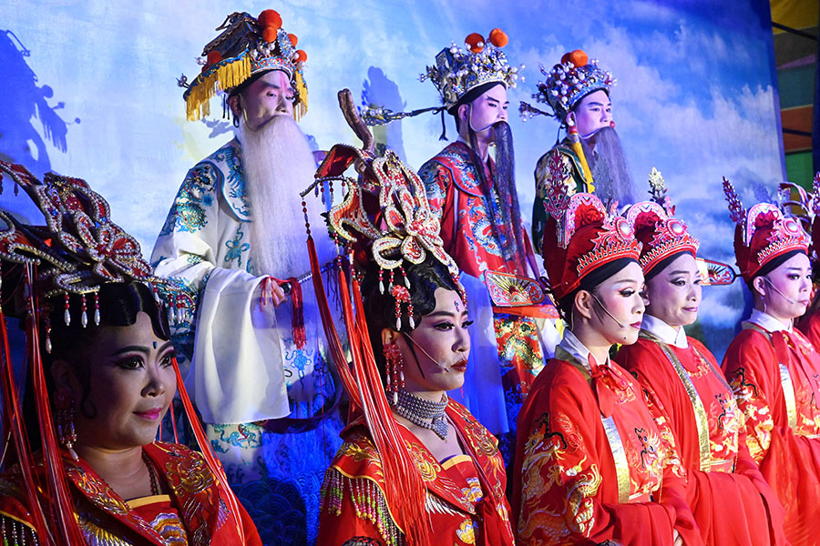 Members of the Jing Sheng Opera onstage during the first day of the Hakka Festival at the Yimin temple in Taoyuan
Image: Sam Yeh / AFP©
