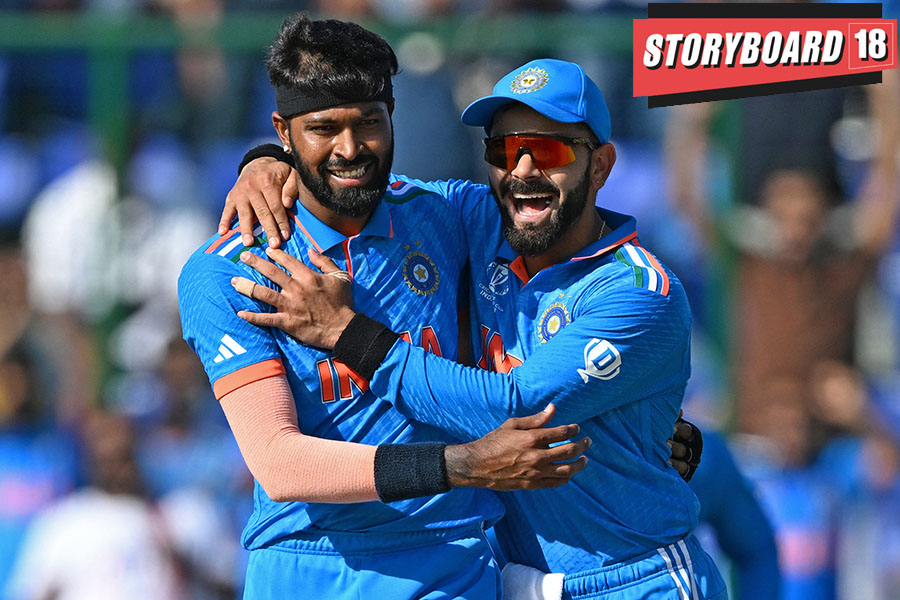 India's Hardik Pandya (L) celebrates with teammate Virat Kohli after taking the wicket of Afghanistan's Rahmanullah Gurbaz during the 2023 ICC Men's Cricket World Cup one-day international (ODI) match between India and Afghanistan at the Arun Jaitley Stadium in New Delhi on October 11, 2023. Image: Money SHARMA / AFP
