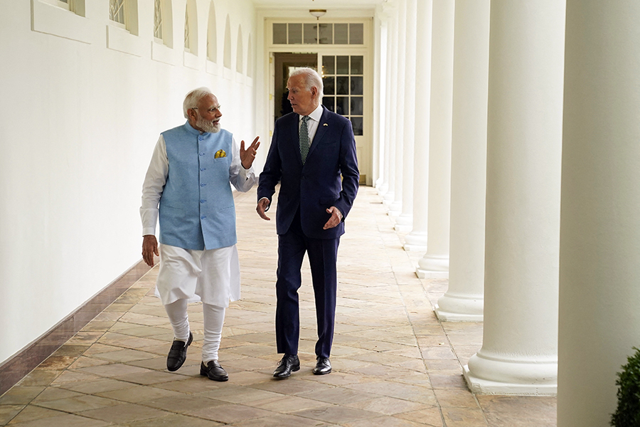 (File photo) US President Joe Biden and India's Prime Minister Narendra Modi walk through the Colonnade to the Oval Office of the White House in Washington, DC, on June 22, 2023. Image: Evan Vucci / POOL / AFP
