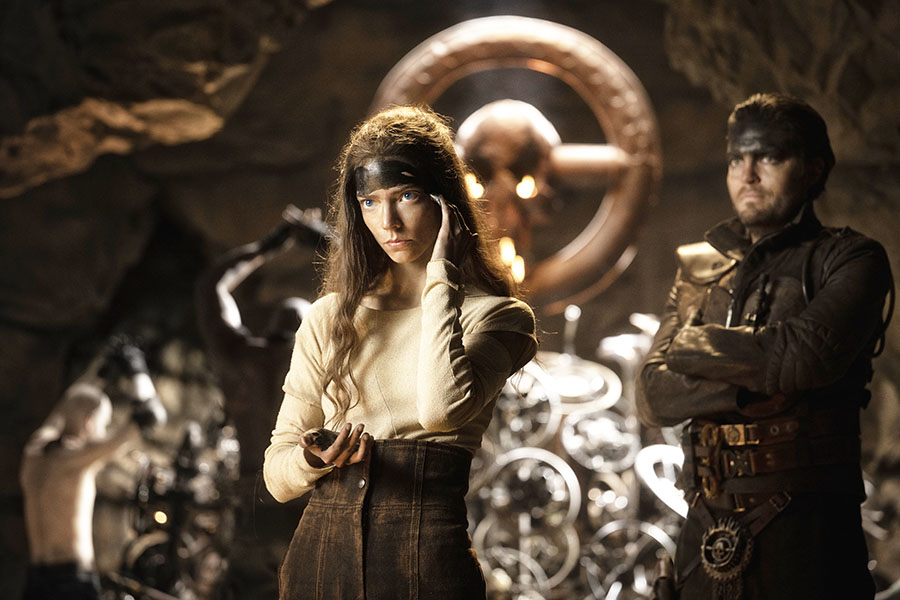  
Image Caption - (L to r) Anya Taylor-Joy as Furiosa and Tom Burke as Praetorian Jack in 