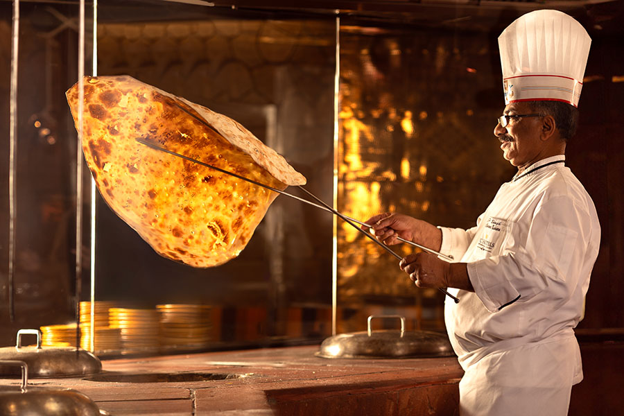 The legendary chef JP holds up the show-stopper Naan Bukhara, in Bukhara Restaurant, ITC Maurya, New Delhi.