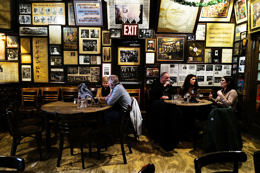 Customers are seen drinking beers at McSorley's Old Ale House in New York.
Image: Charly Triballeau / AFP©