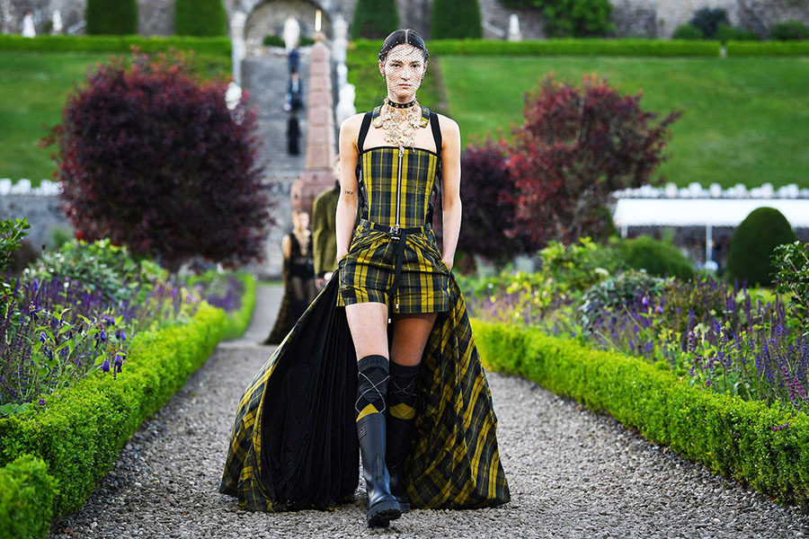 A model presents a creation for Dior during the 2025 Dior Croisiere (Cruise) fashion show on June 3, 2024 at Drummond Castle, in Crieff, in Scotland.