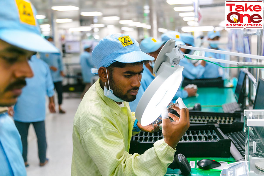 Workers on the assembly line at electronics manufacturing services company Dixon Technologies’ Noida facility; Image: Madhu Kapparath