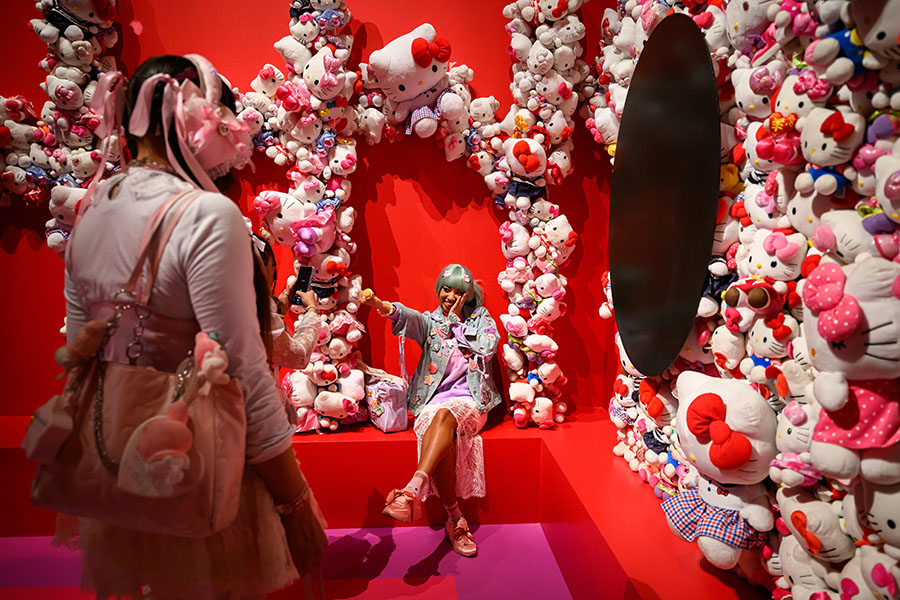 Social media influencer Chixpudding (R) at Hello Kitty's 50th anniversary event titled CUTE, an exhibition exploring cuteness, in London, in January 2024. Image: Leon Neal/Getty Images
